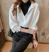 Finley™ - Elegante Rollkragenbluse